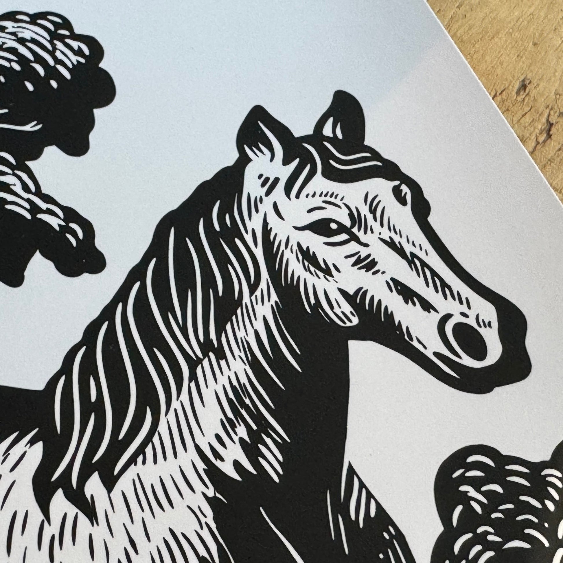 Black and white horse illustration on a textured paper background
