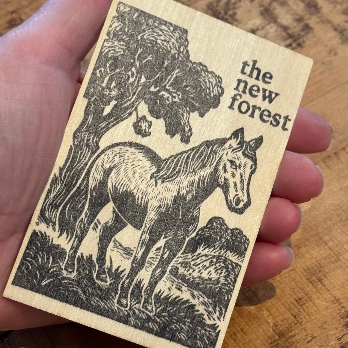 New Forest Pony Block Print Wooden Keepsake in hand at an angle