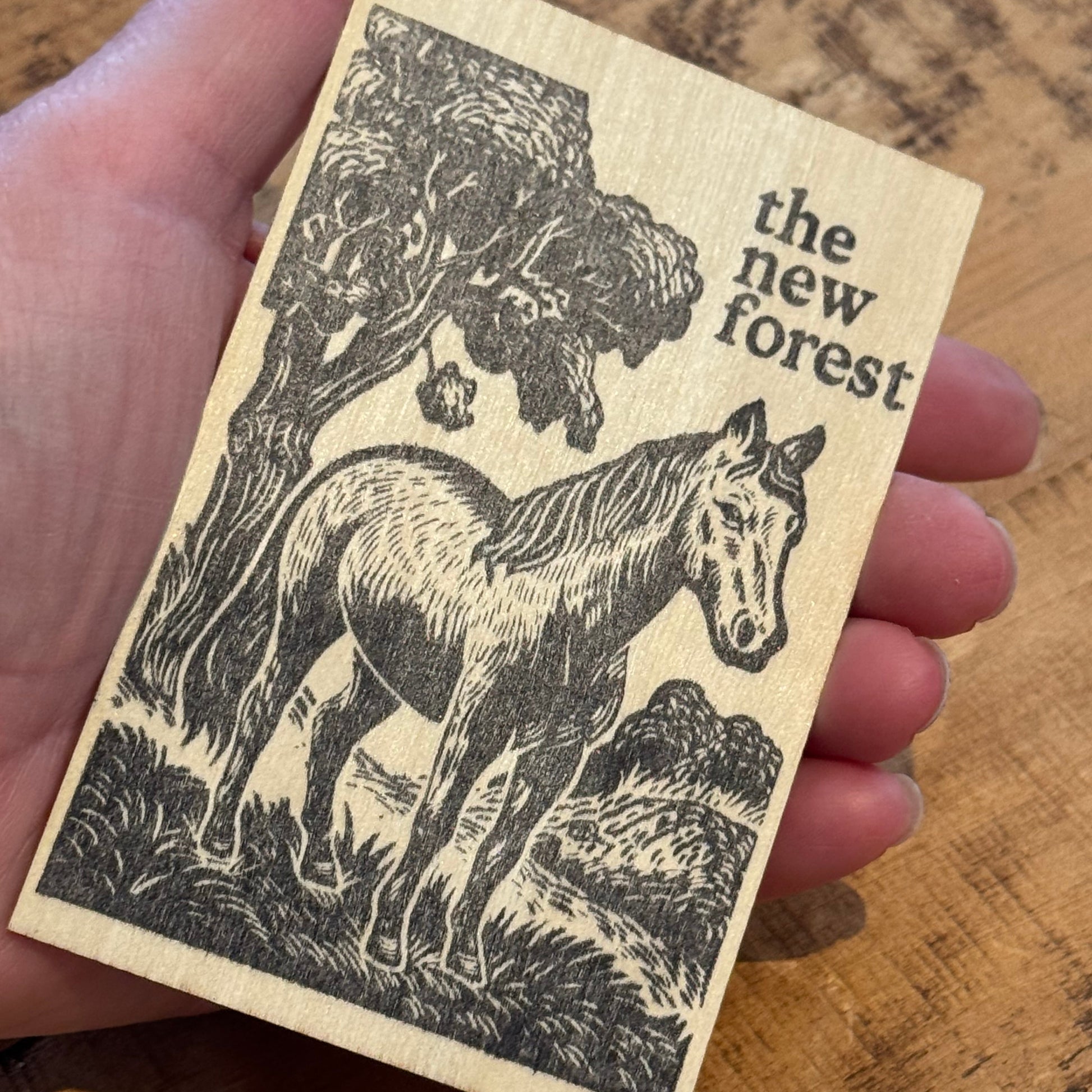 New Forest Pony Block Print Wooden Keepsake in hand at an angle