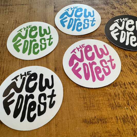 The New Forest Typography Circle Sticker (Solid) Set on Desk