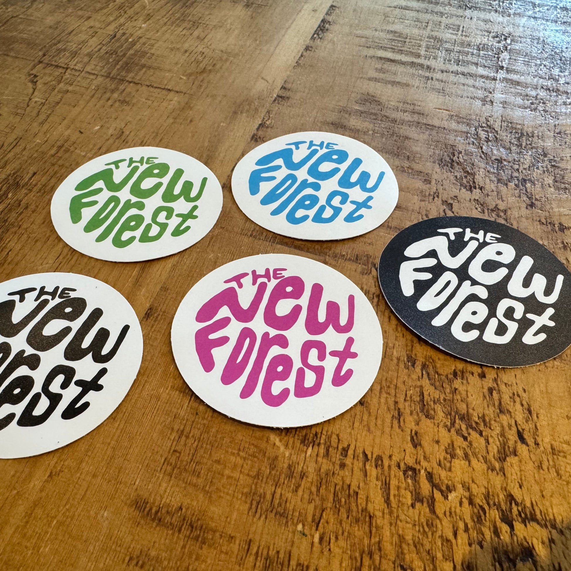 The New Forest Typography Circle Sticker (Solid) Set on Desk